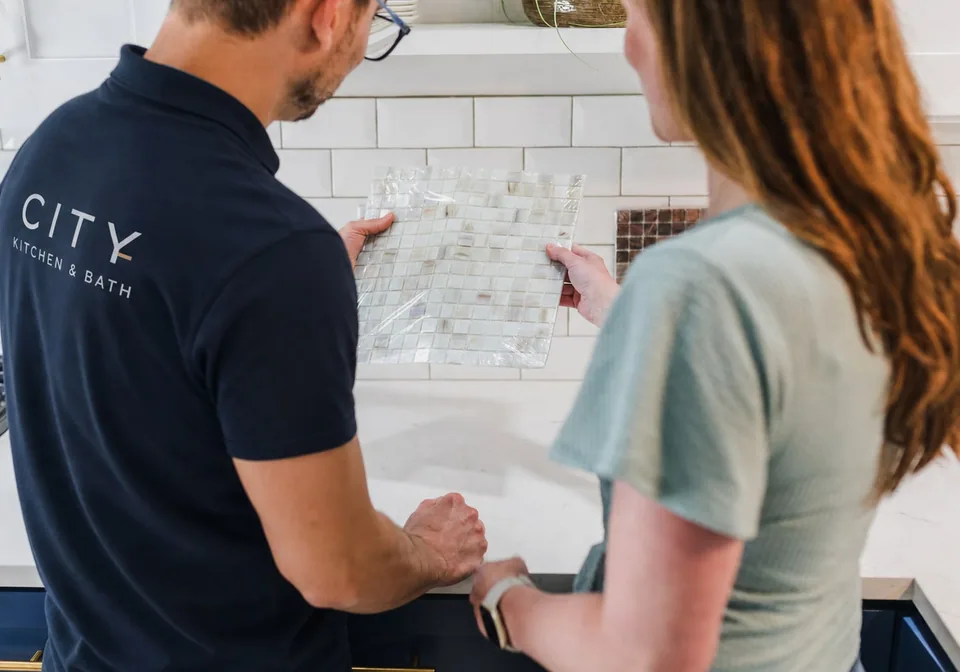 City Kitchen & Bath team guiding homeowners through a full-service remodeling consultation
